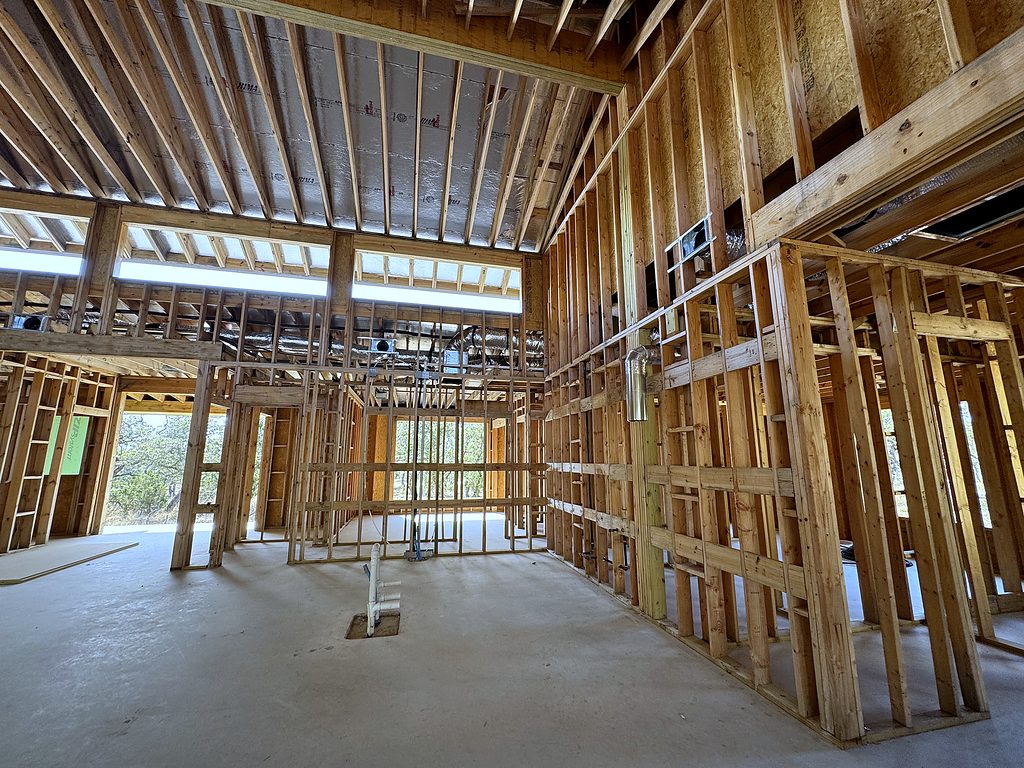 Real photo of interior framing under the vaulted great room clerestory at 168 Crooked Creek Court, September 2025