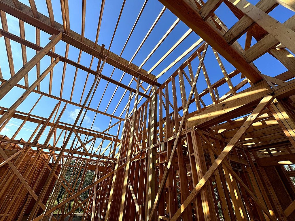 Real photo of the vaulted roof framing at 168 Crooked Creek Court, Johnson City, TX, 2025